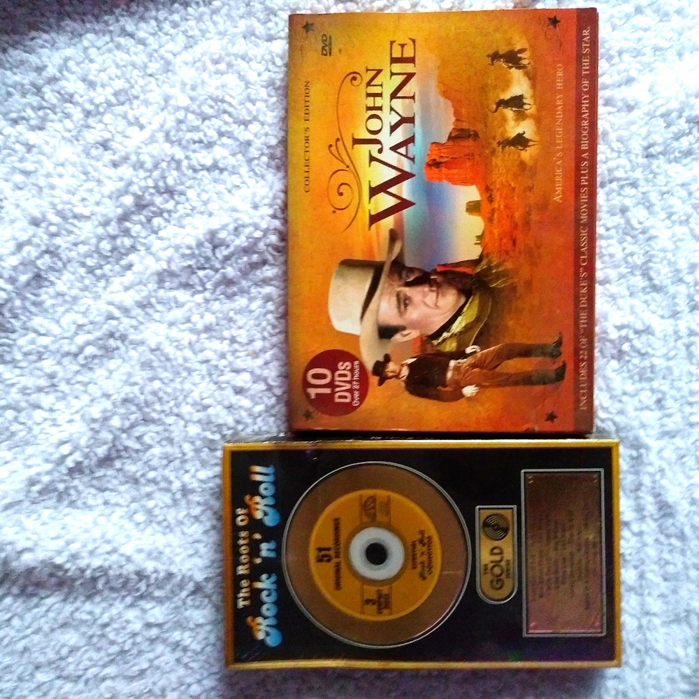 John Wayne dvds never open cd never opened oldies